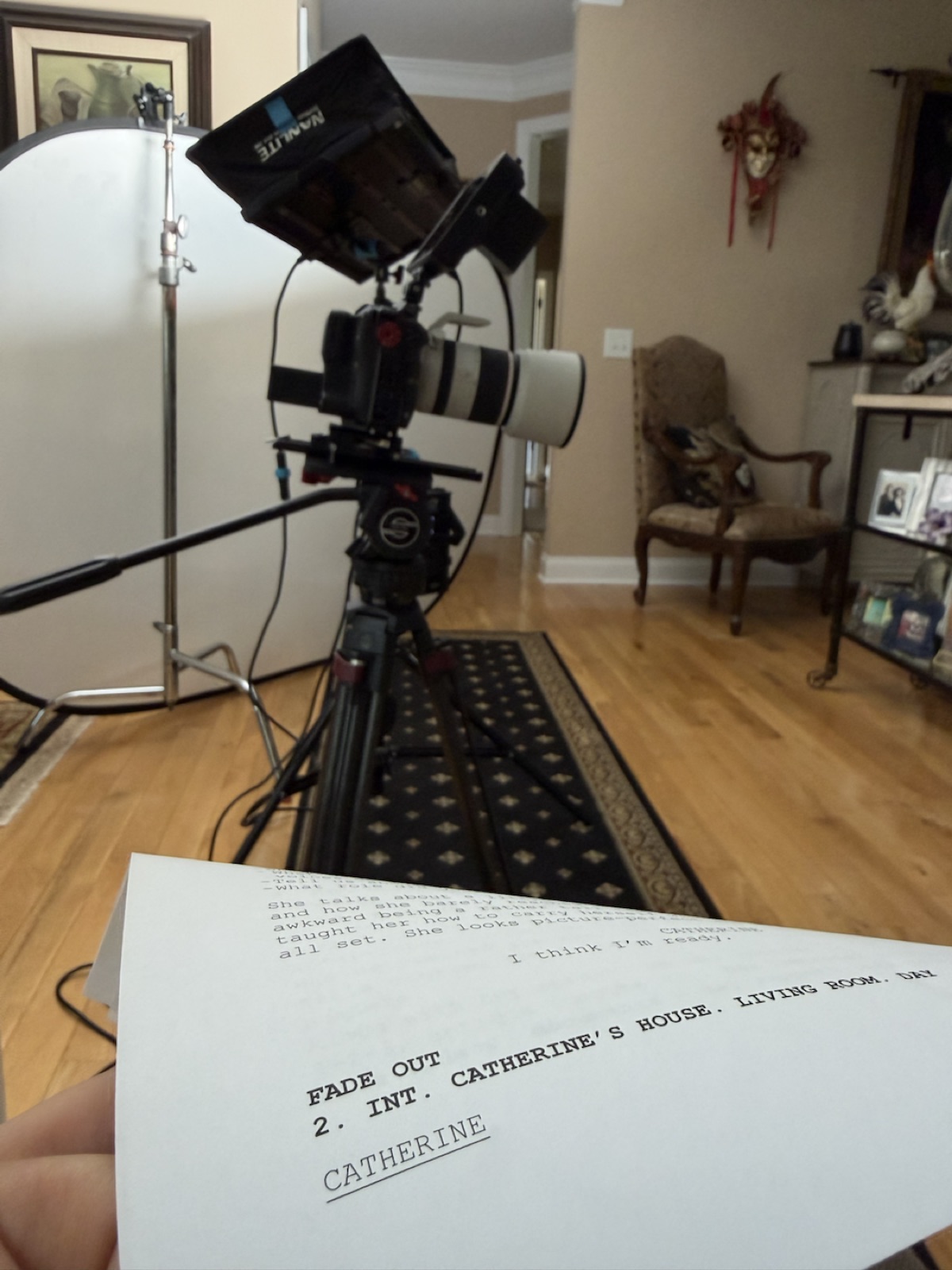 Cinema lens beside a printed script